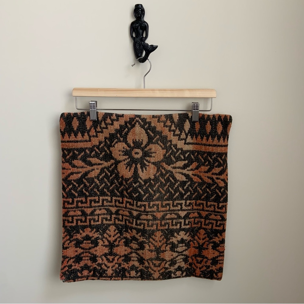 Unlabelled, black grey tan and rust throw pillow cover